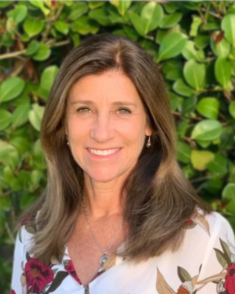 Headshot of Carol Borough Perez, Principal of AGTLAND